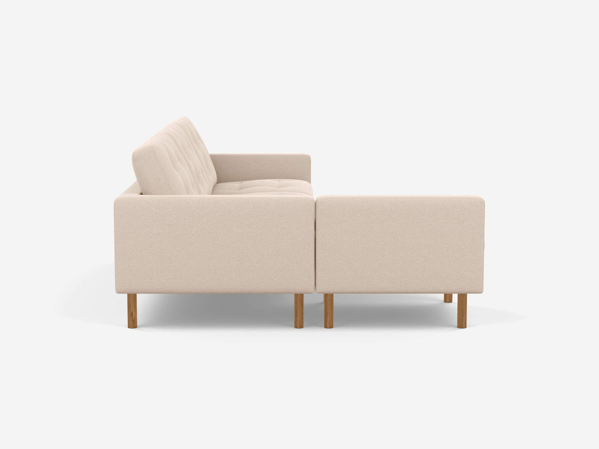 Left side view of beige mid century sectional sofa